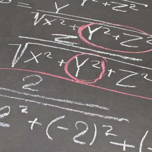 Physics formula written on a blackboard